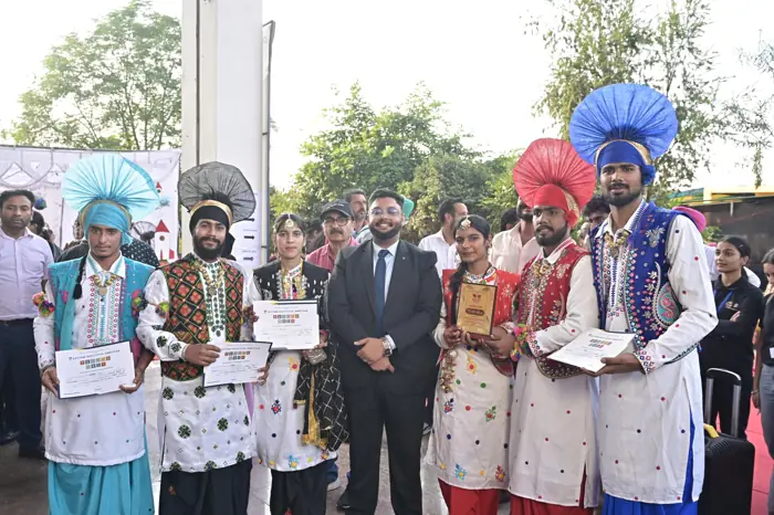 Prize winners in traditional dress