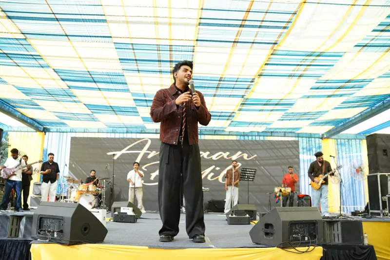 Armaan Bedil singing on the Technomela stage with his band